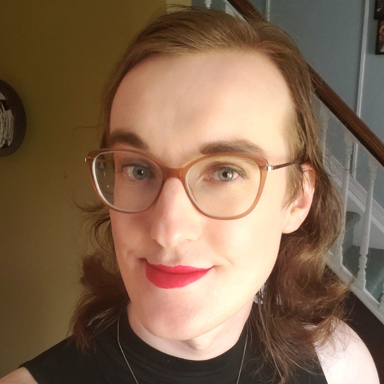 Headshot of me wearing red lipstick