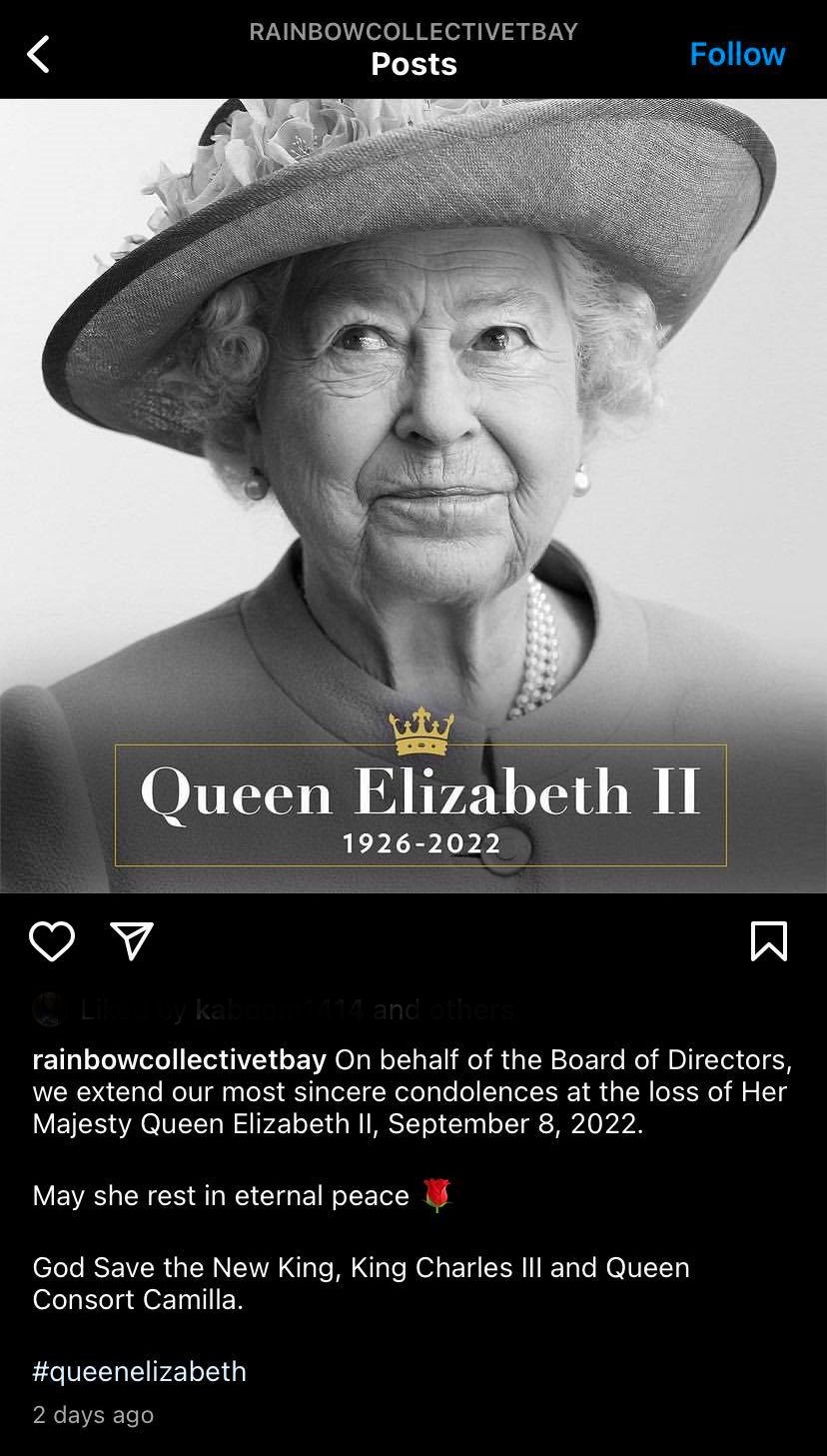 Screenshot from a now-deleted Instagram post by @rainbowcollectivetbay. The post extends condolences to the royal family for the death of Queen Elizabeth and wishes 'God Save the New King' to King Charles and Queen Consort Camilla.