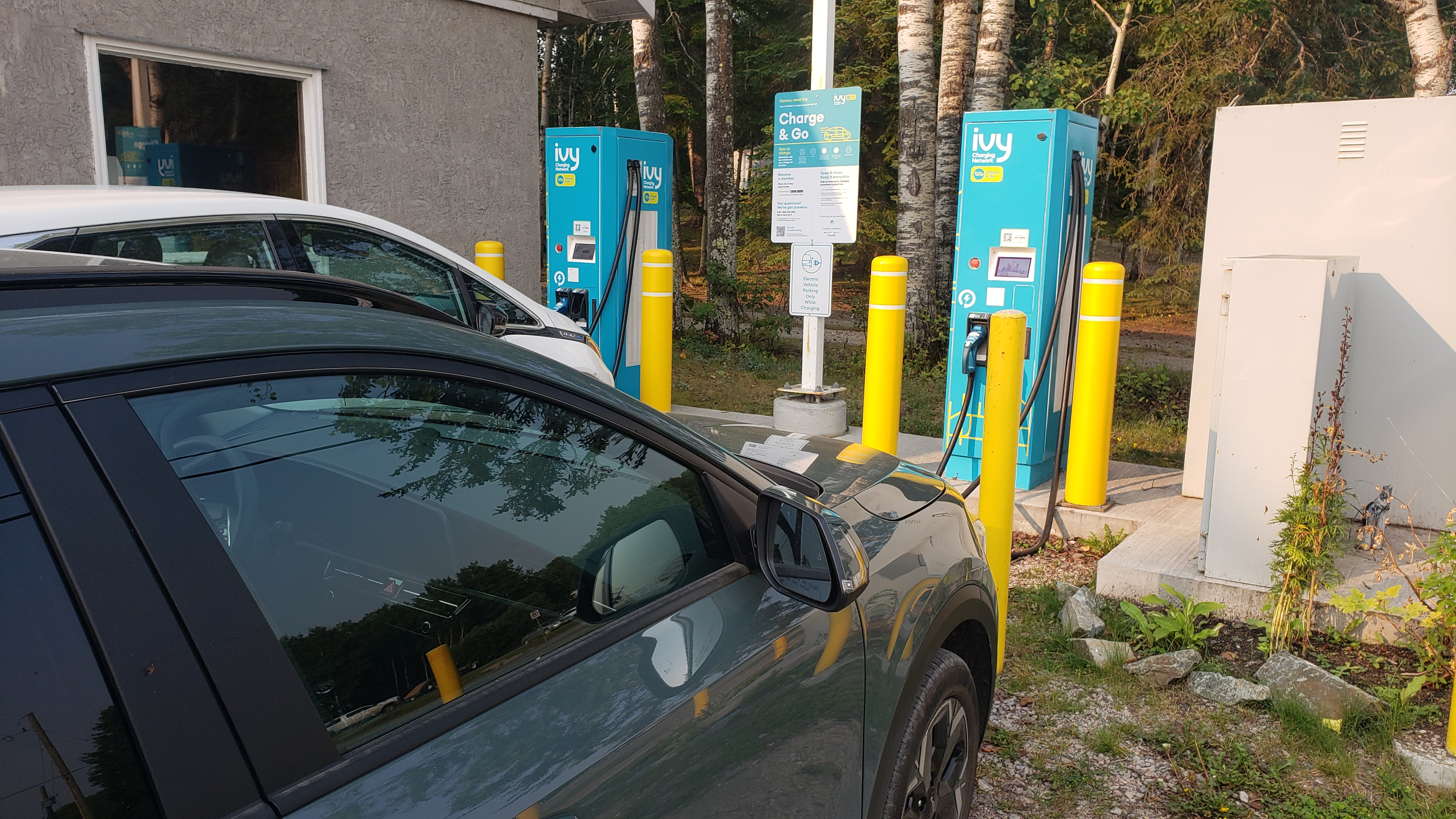 Photo of my car parked in front of an Ivy Level 3 charging station.
