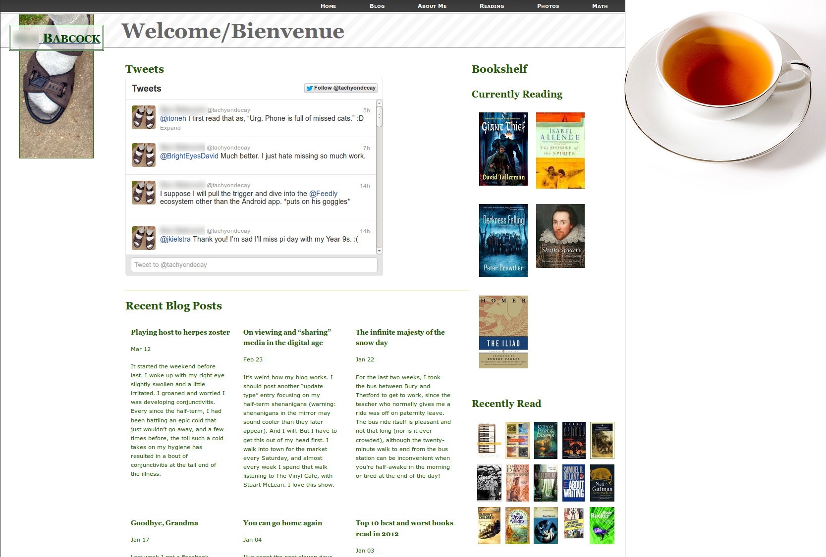 Screenshot of the homepage of my website from 2013. Socks and sandals on a vertical rectangular banner at the top left. The text is green on a beige background. There is a cup of tea in the top right corner.